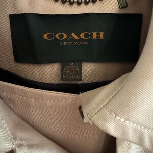 Coach jacket rarely worn. Clearing closet no stains or rips.